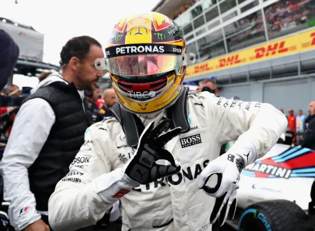 Lewis Hamilton celebrates after securing pole at Monza in 2017