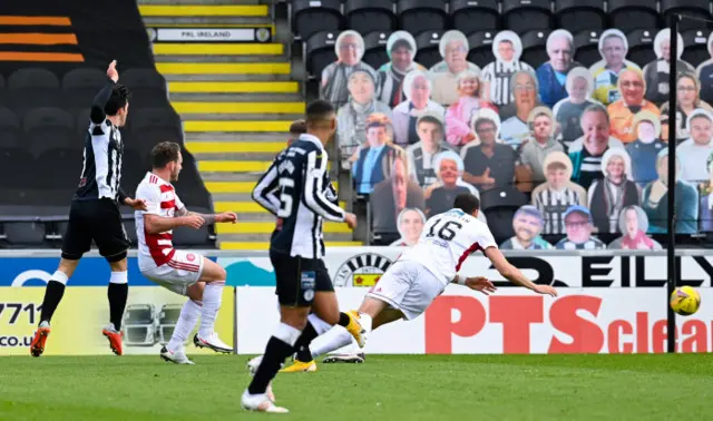 Jamie McGrath scores