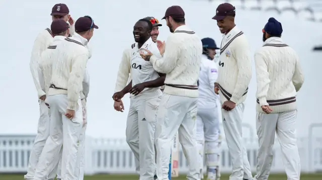 Kemar Roach celebrates