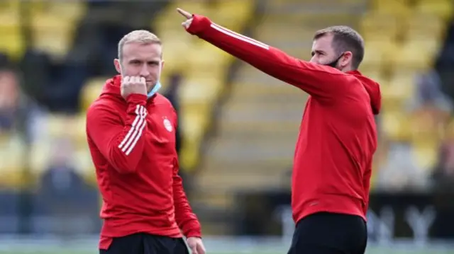 Aberdeen's Dylan McGeouch and Gary Woods