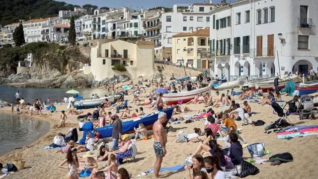 Tourists on a beach