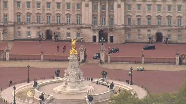 Cars leave Buckingham Palace