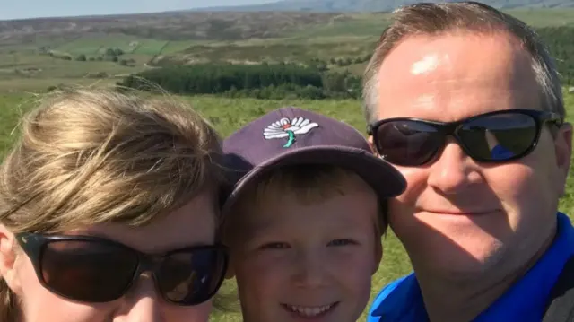 Sam Darnbrook with his parents John and Caroline