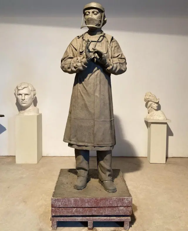 Statue of medic in PPE for National Emergency Services Memorial