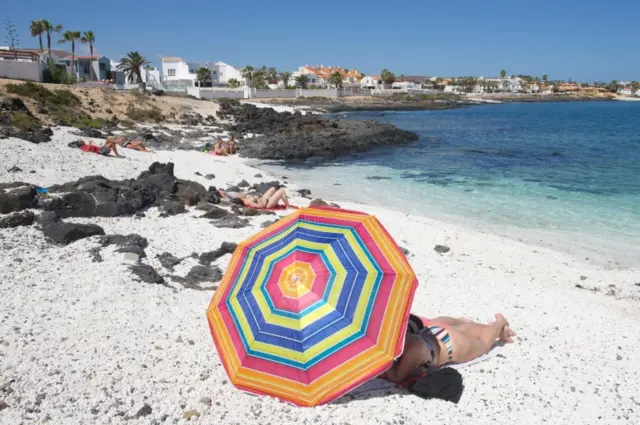 Tourists enjoy April sun in Fuerteventura, Canary Islands