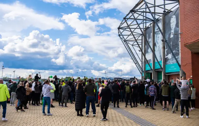 Celtic supporters greet the team buses to welcome captain Scott Brown