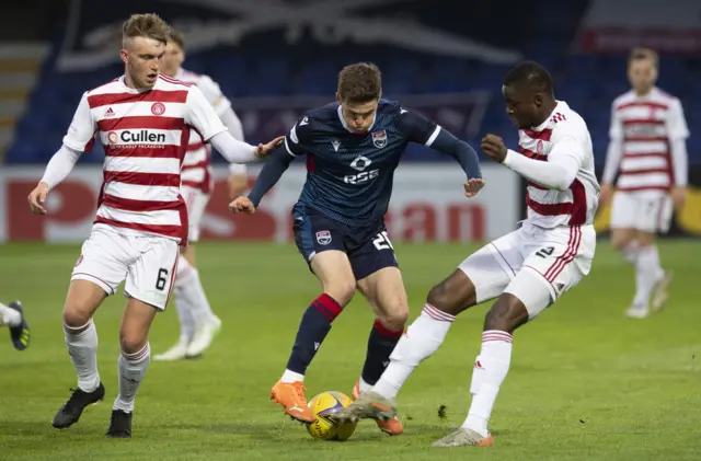 Hamilton's Hakeem Odoffin battles with Ross County's Blair Spittal