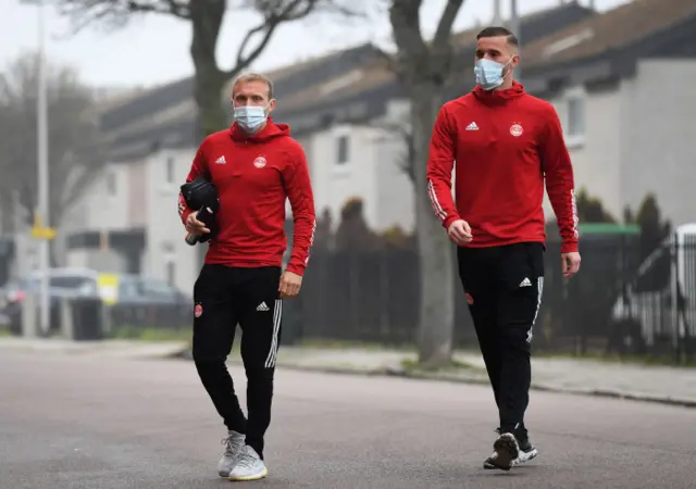 Aberdeen's Dylan McGeouch (left) and Gary Woods