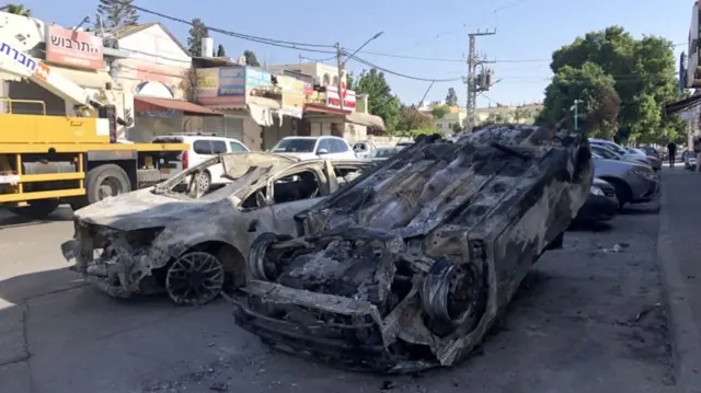 Cars burned out in Lod, Israel