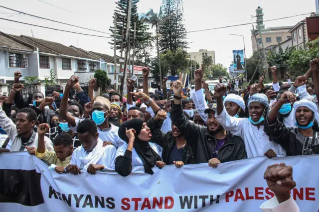 Muslim demonstrators march during their protest against Israel's deadly air strikes launched on Gaza, in Nairobi, Kenya  (13 May 2021)