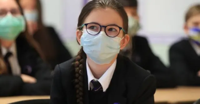 School pupil wearing face mask