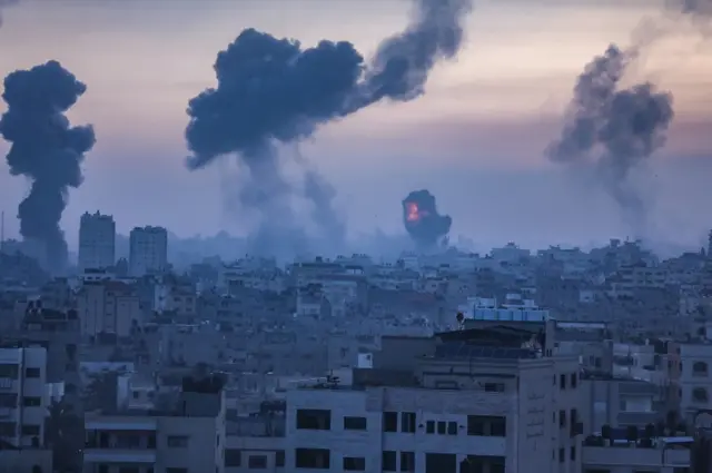 Smoke and flames rise after an Israeli air strike on Gaza City. Photo: 12 May 2021