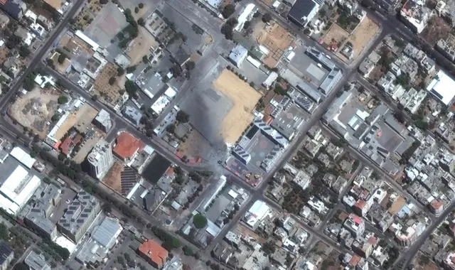 A satellite view shows buildings destroyed by airstrikes in Gaza City May 12, 2021. Satellite image 2021 Maxar Technologies/Handout