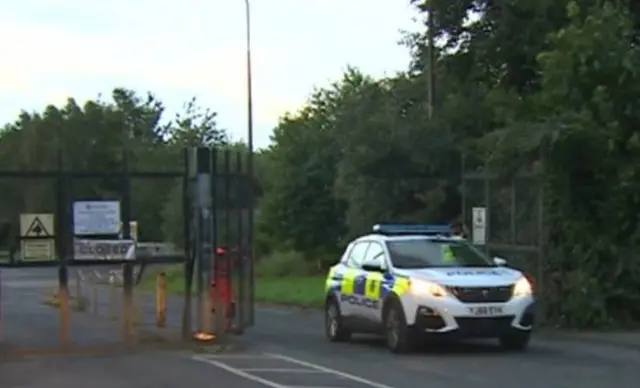 Police car at recycling centre