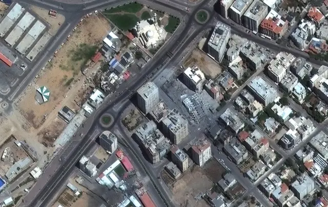 A satellite view shows multistory building destroyed by airstrikes in Gaza City May 12, 2021