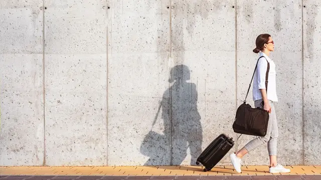 A woman with a suitcase