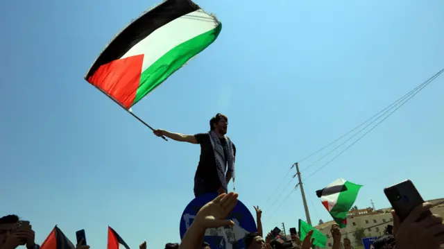 Protesters gathered near the Israeli border in Jordan