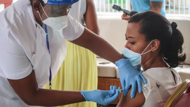 A nurse injects the Chinese Covid-19 vaccine produced by Sinopharm in Victoria, Seychelles on January 10, 2021.