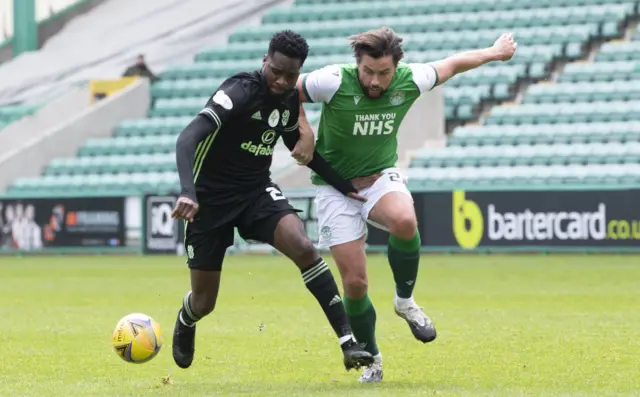 Odsonne Edouard tries to escape from Hibs defender Darren McGregor