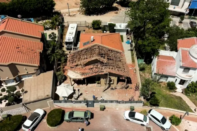 A drone picture shows the house of El-Gazar family which has been damaged after a rocket was fired from Gaza towards Israel, in Sderot, southern Israel, on 15 May 2021