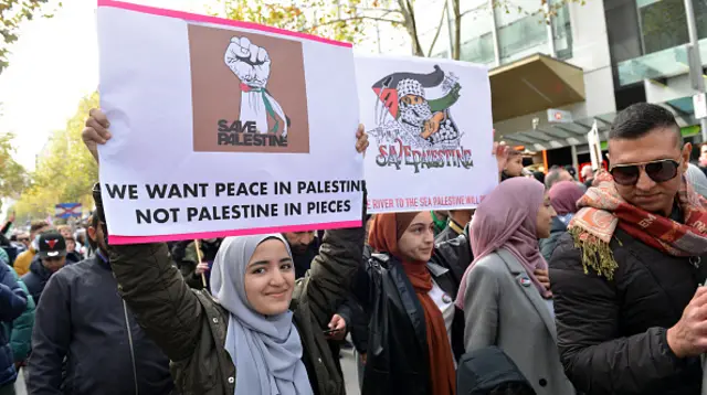 People demonstrate in solidarity with Palestinians and protest against Israeli attacks on Gaza Strip, in Melbourne, Australia