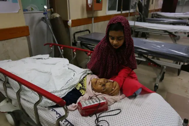 Gazans injured in Israeli attack on home of Palestinian Abu Khatab familiy living in al-Shati Camp in Gaza Strip, receive treatment at Shifa Hospital on 15 May 2021 in Gaza City