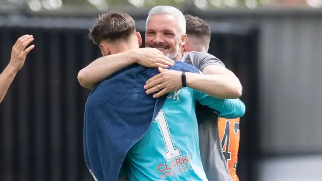 St Mirren manager Jim Goodwin embraces goalkeeper Jak Alnwick at full-time