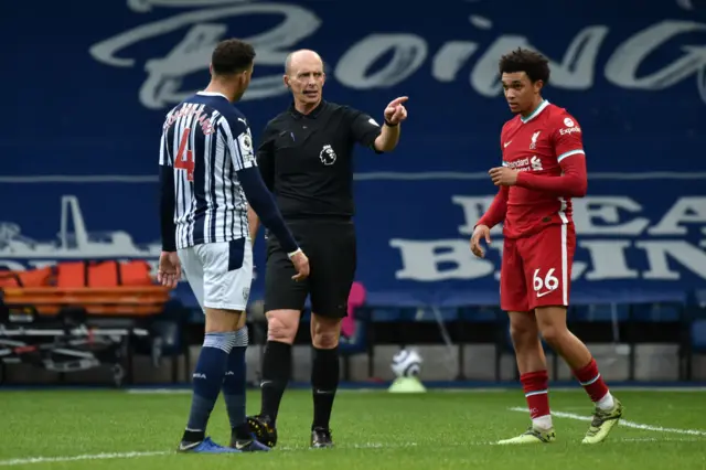 Hal Robson-Kanu speaking to Mike Dean