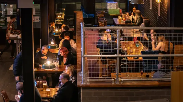 Customers in a pub