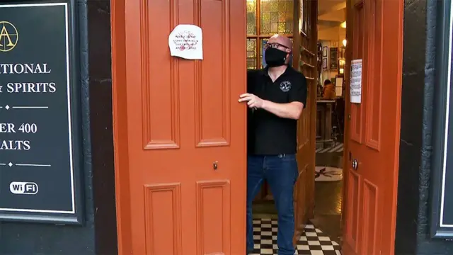 Doors closing at a pub