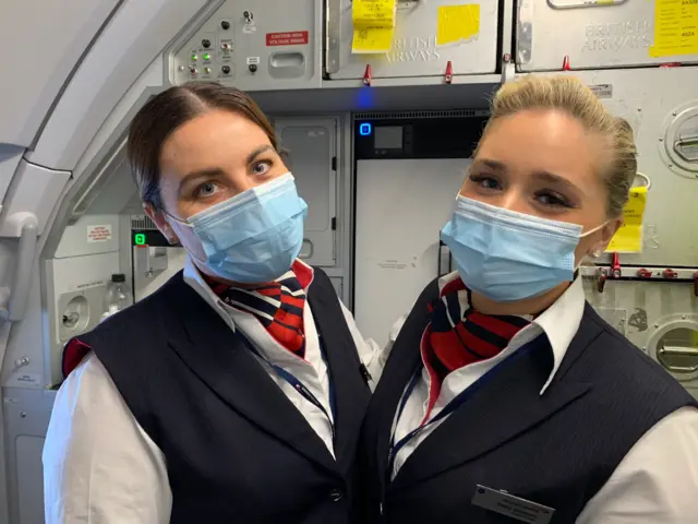 Air crew on board a flight to Portugal