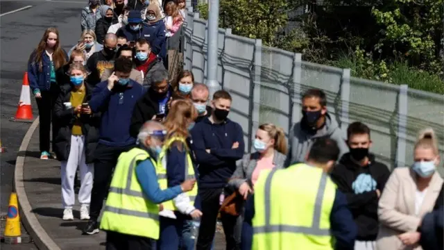 A queue of people in Bolton