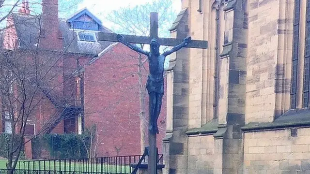 The bronze sculpture outside the church