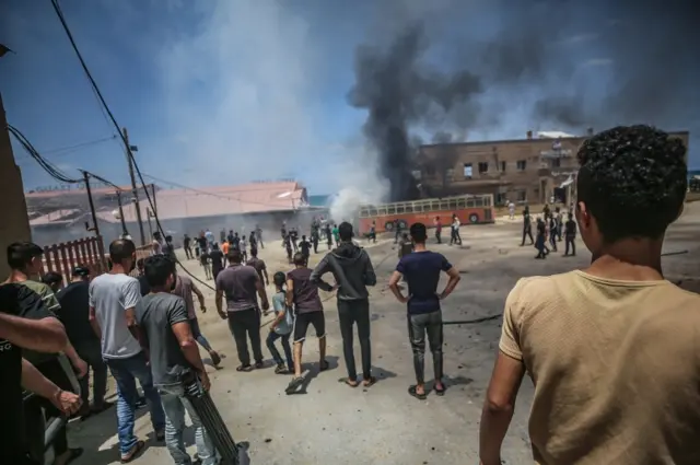 An Israeli air strike targeting a car in Gaza City, 17 May 2021