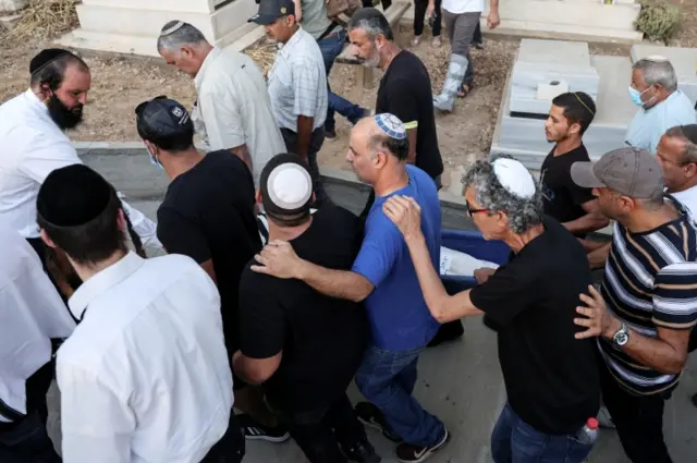 Funeral of Israeli man, Yigal Yehoshua, who died after succumbing to his wounds, sustained during Arab-Jewish violence in the mixed city of Lod, at a cemetery in Moshav Hadid