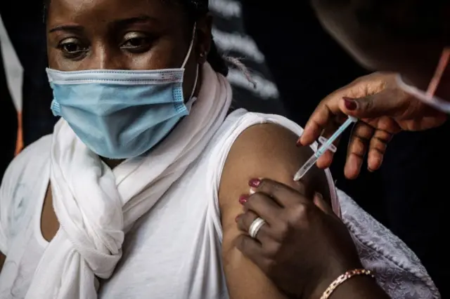 Woman being vaccinated