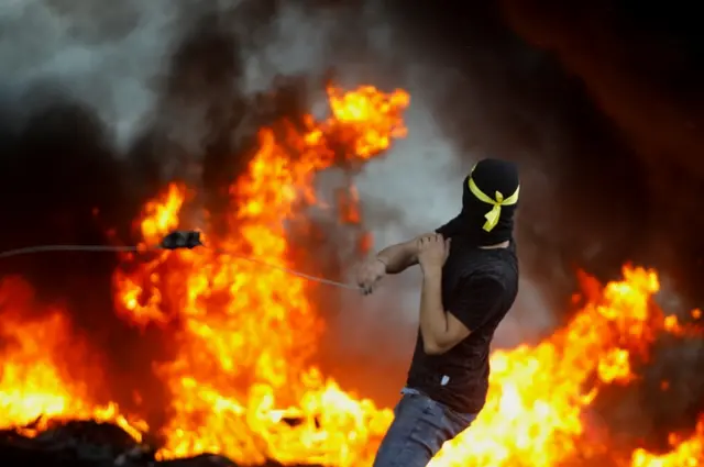 A Palestinian demonstrator takes part in an anti-Israel protest