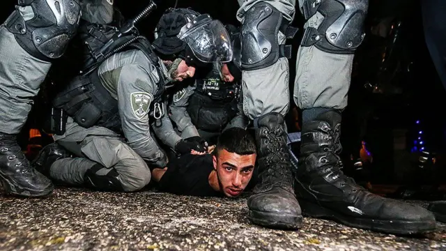 Israeli police detain a protester. File photo