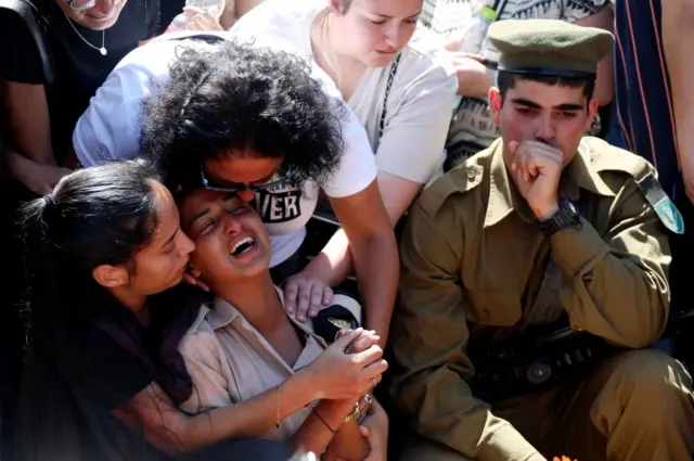 Image shows the funeral of an Israeli soldier