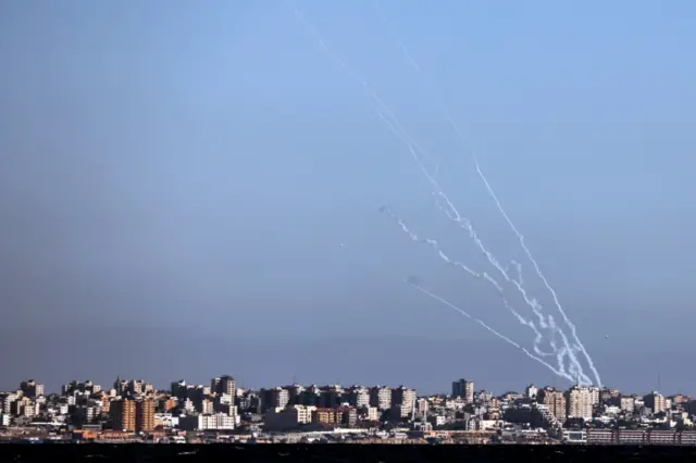 Rockets launched from Gaza towards Israel as it is seen from an Israeli naval boat while patrolling in the Mediterranean Sea