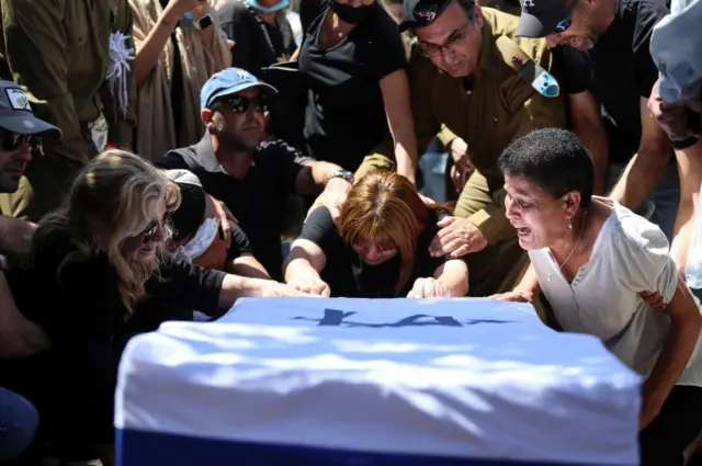 Image shows the funeral of an Israeli soldier