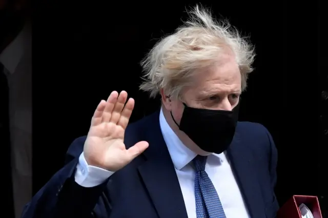 Boris Johnson waved to waiting reporters as he left No 10 a few minutes ago