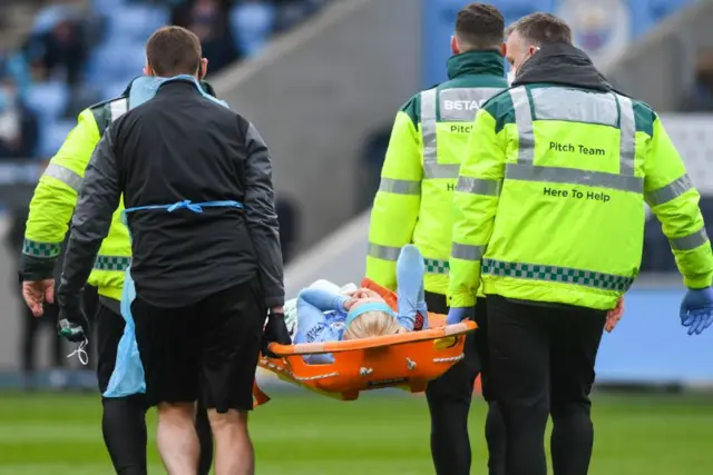 Manchester City's Chloe Kelly is stretchered off