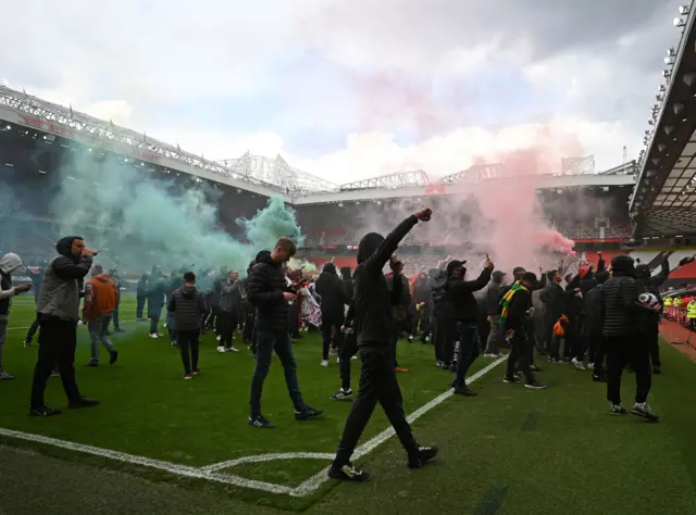 Fans on Old Trafford pitch