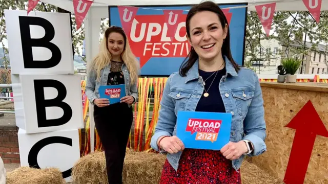 two female presenters in an outside studio
