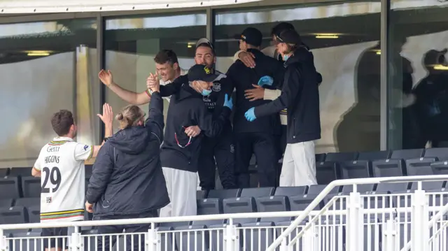 Gloucestershire celebrate victory