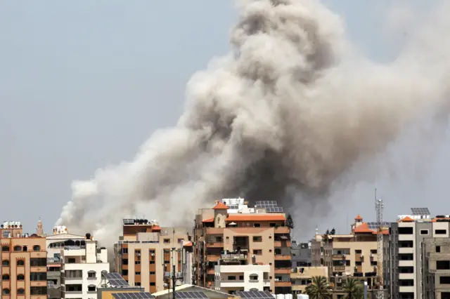 Smoke rises during an Israeli air strike, amid Israeli-Palestinian fighting, in Gaza City, May 20, 2021.