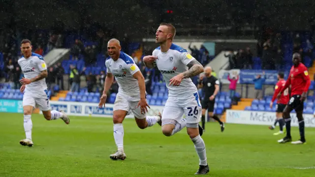 Peter Clarke celebrates his goal