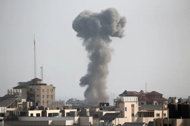 Smoke rises following an Israeli air strike, amid Israeli-Palestinian fighting, in Gaza, May 20, 2021