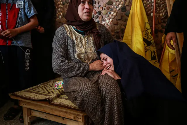 Relatives attend funeral ceremony of boy killed in Israeli air strike